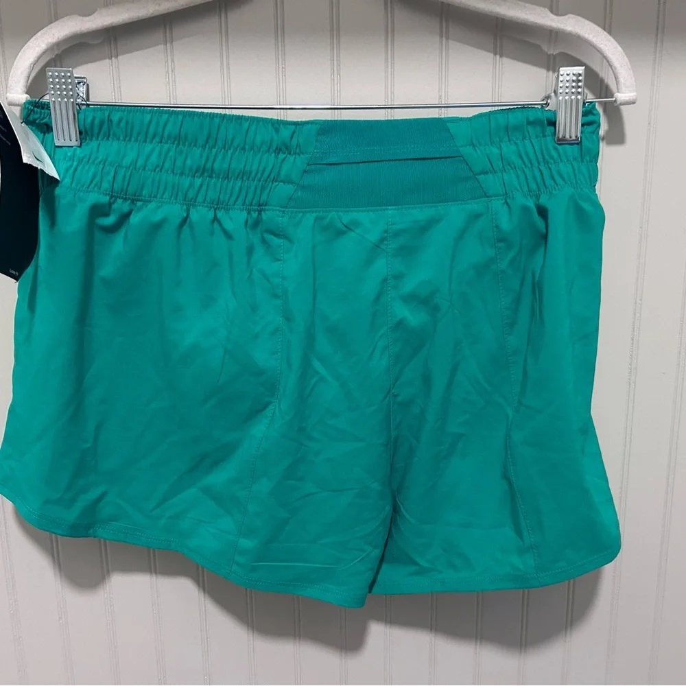 Nike Women’s Teal Athletic Skort with Silver Swoosh